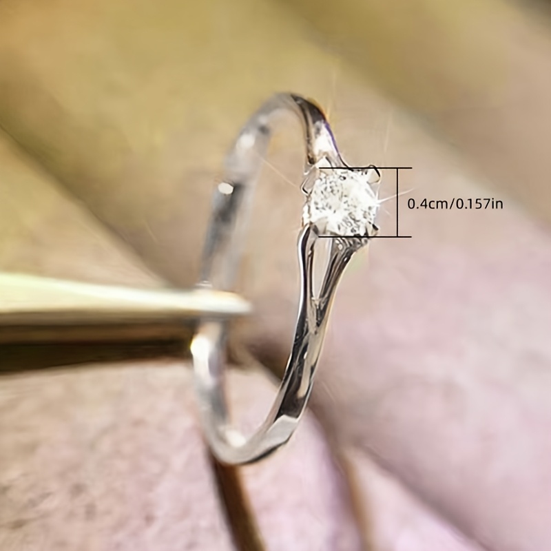 Women's Wedding Band 4 Prong Set Round Zirconia Ring
